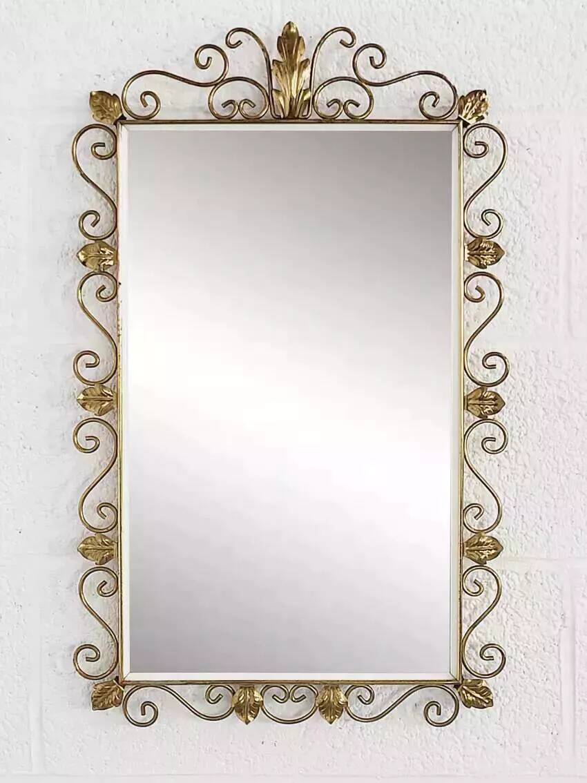 Rectangular mirror from the 1950s with a brass frame.