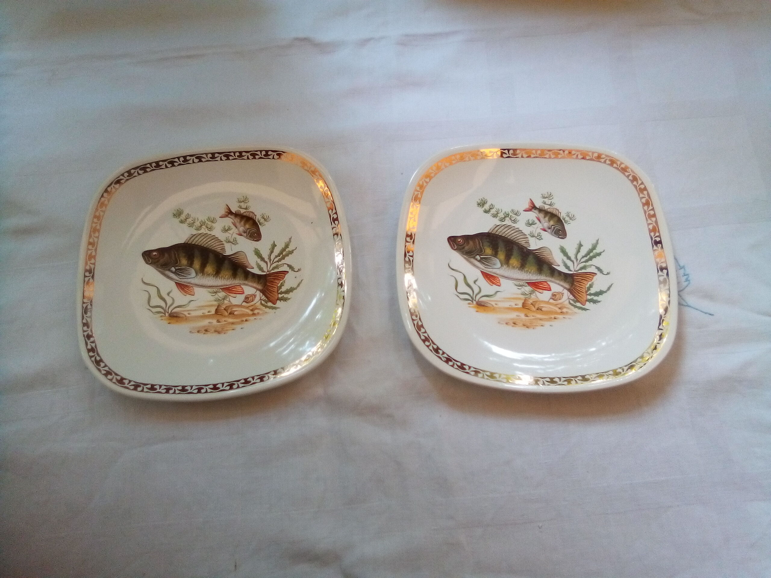 Set of 12 Longchamp plates and fish dish