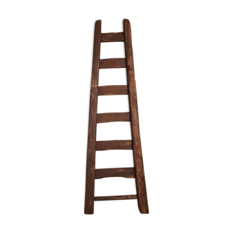 Old ladder in raw wood