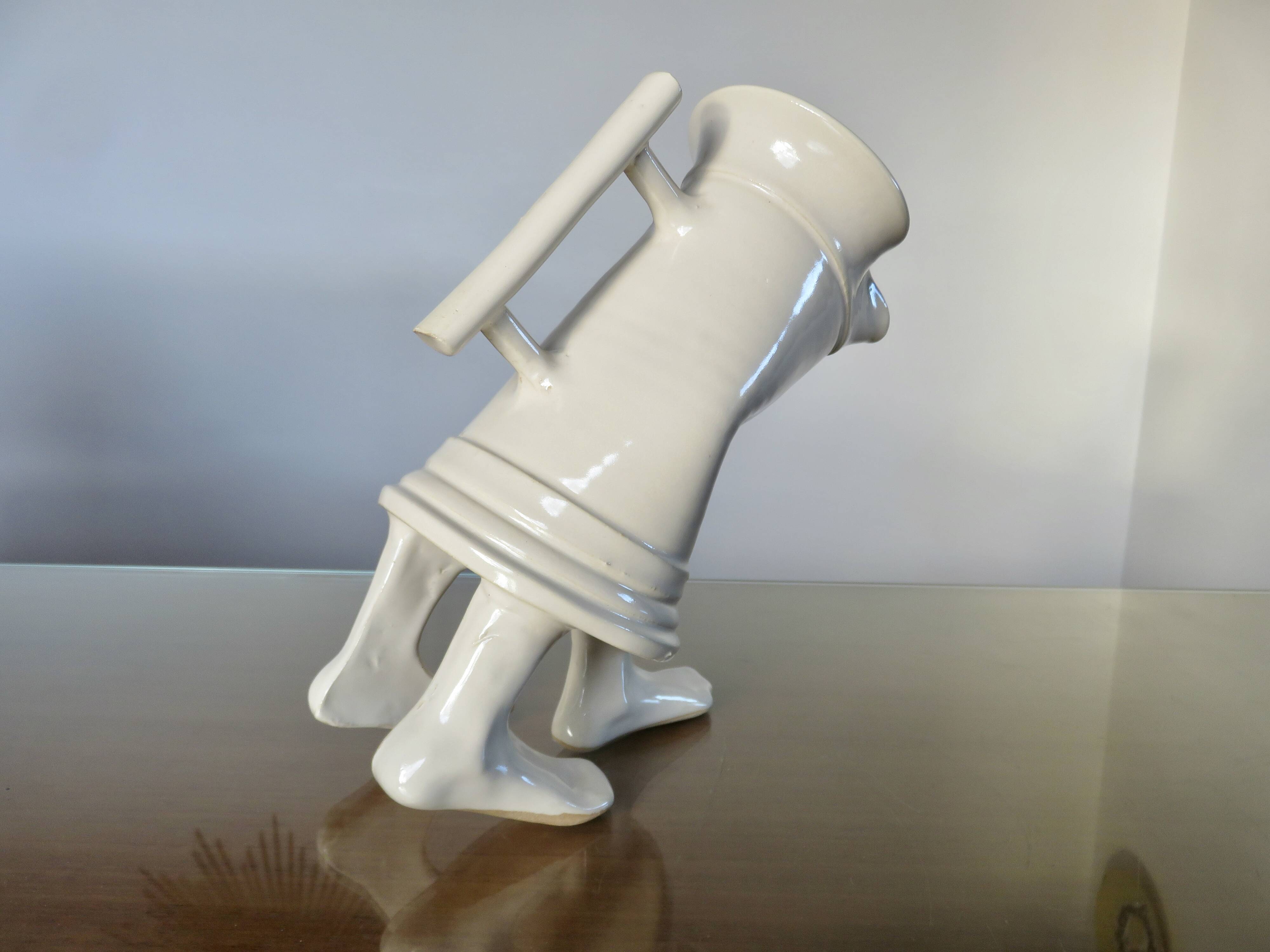 Anthropomorphic jug in slipware