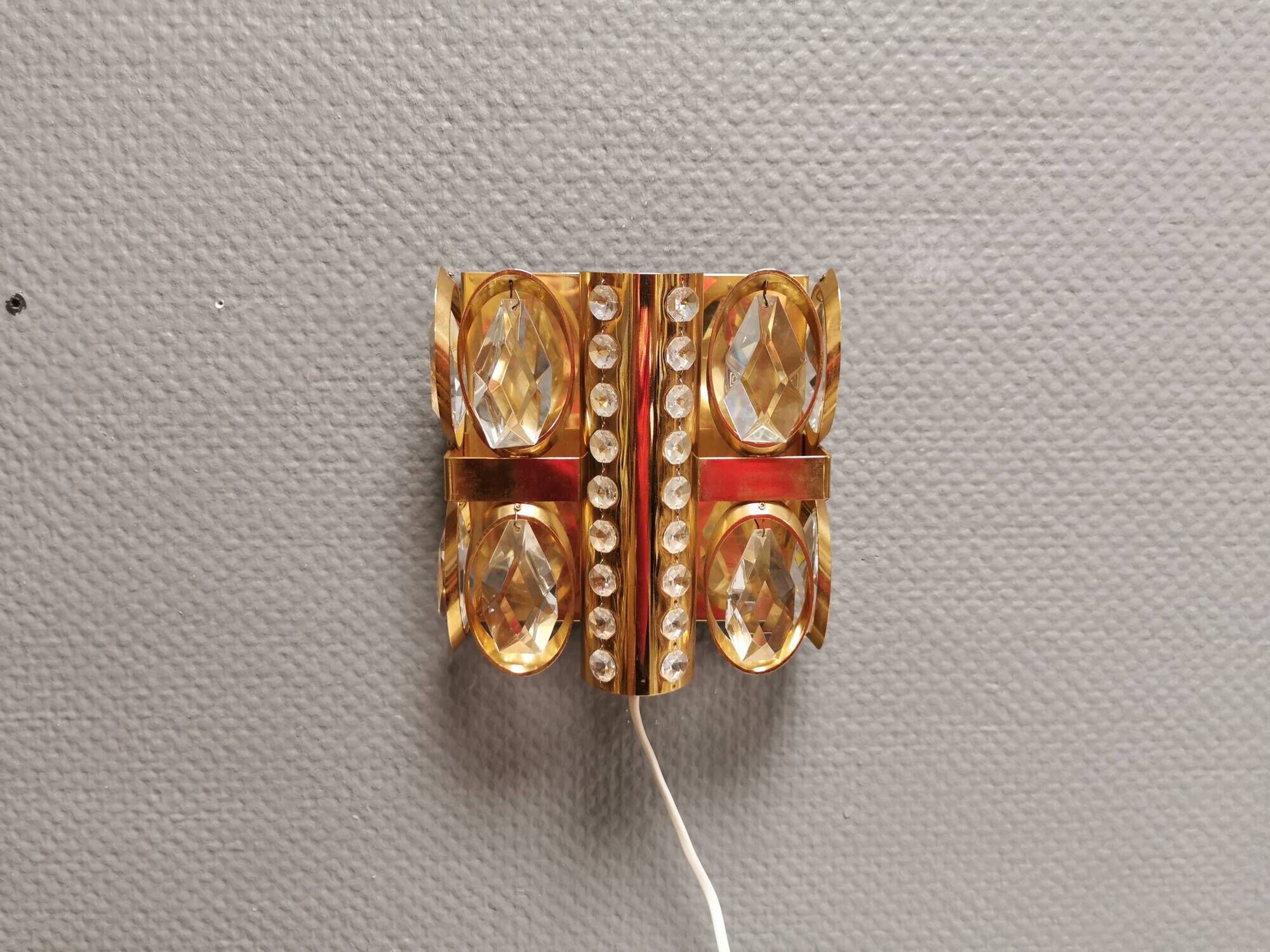 Swedish wall lamp in gold-colored metal with glass prisms. Estimated 1970-80s.