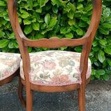 Pair of Louis XV chairs in carved walnut.