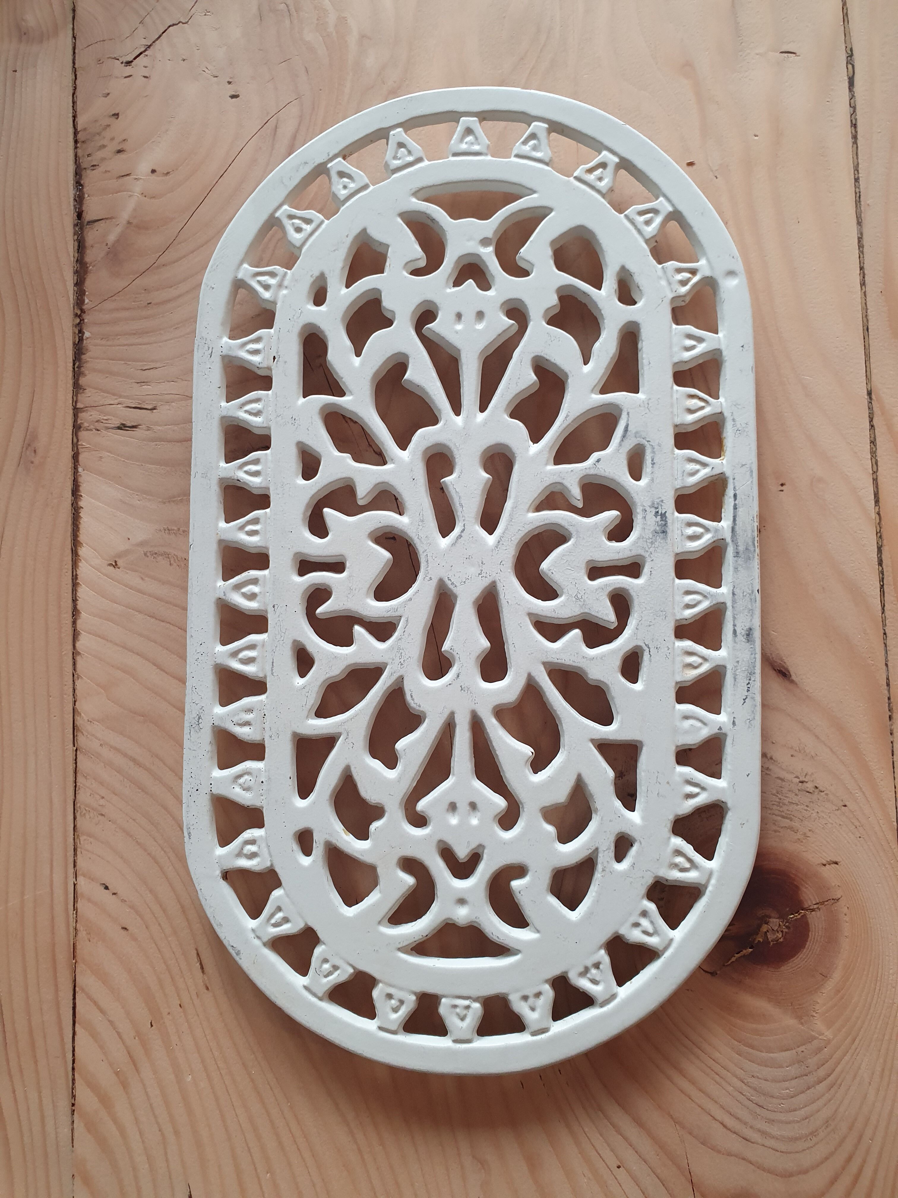 Dessous de plat en fonte
