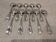 10 silver-plated metal coffee spoons, PG style, Art Nouveau flowers.