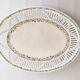 Oval dish in openwork earthenware from Sarreguemines, blue ribbon and fruit