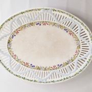 Oval dish in openwork earthenware from Sarreguemines, blue ribbon and fruit