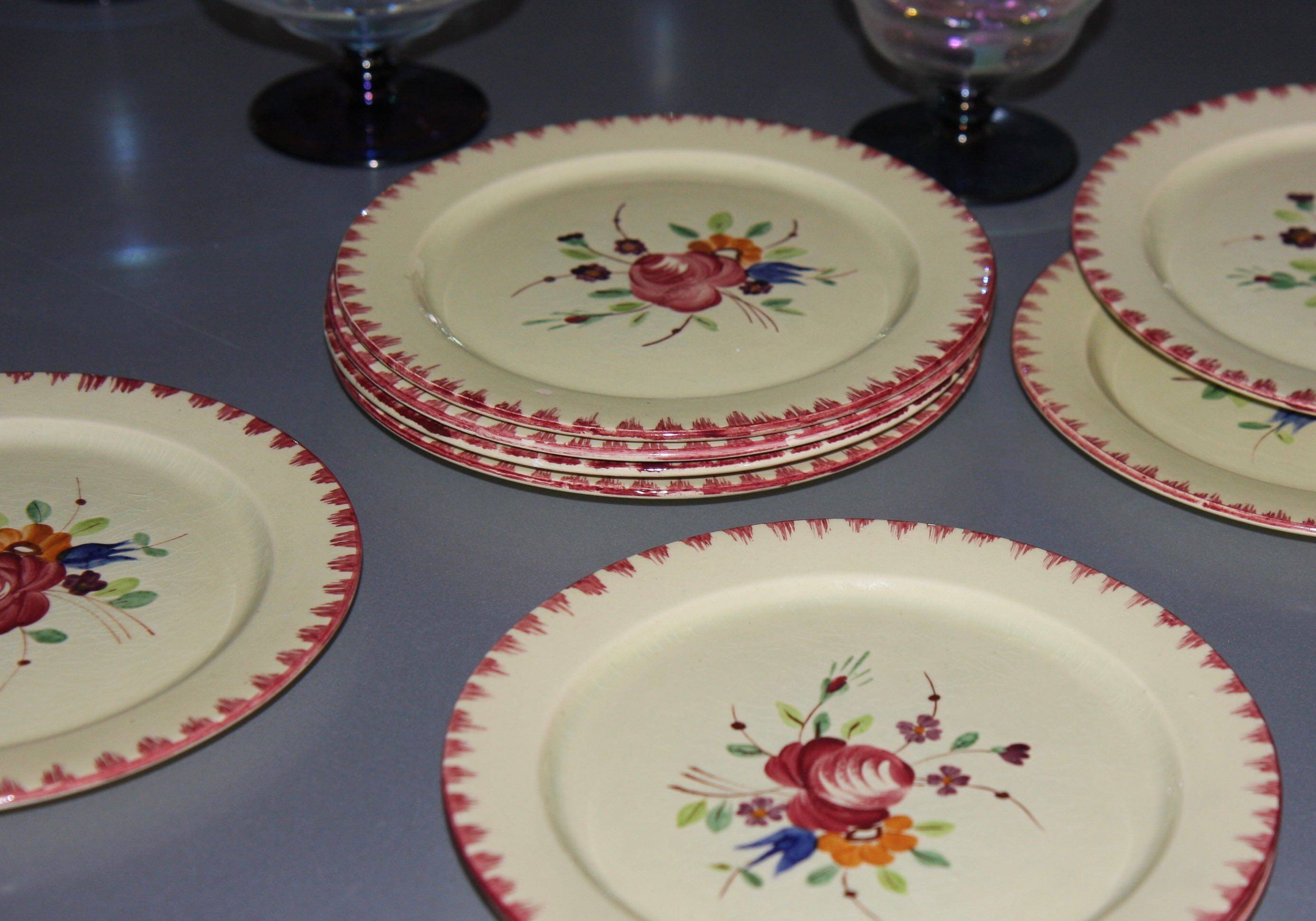 Eleven vintage plates in fine earthenware from Longchamp, Padua model.