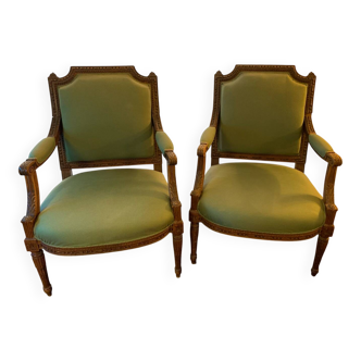 Pair of Louis XVI style armchairs in solid walnut