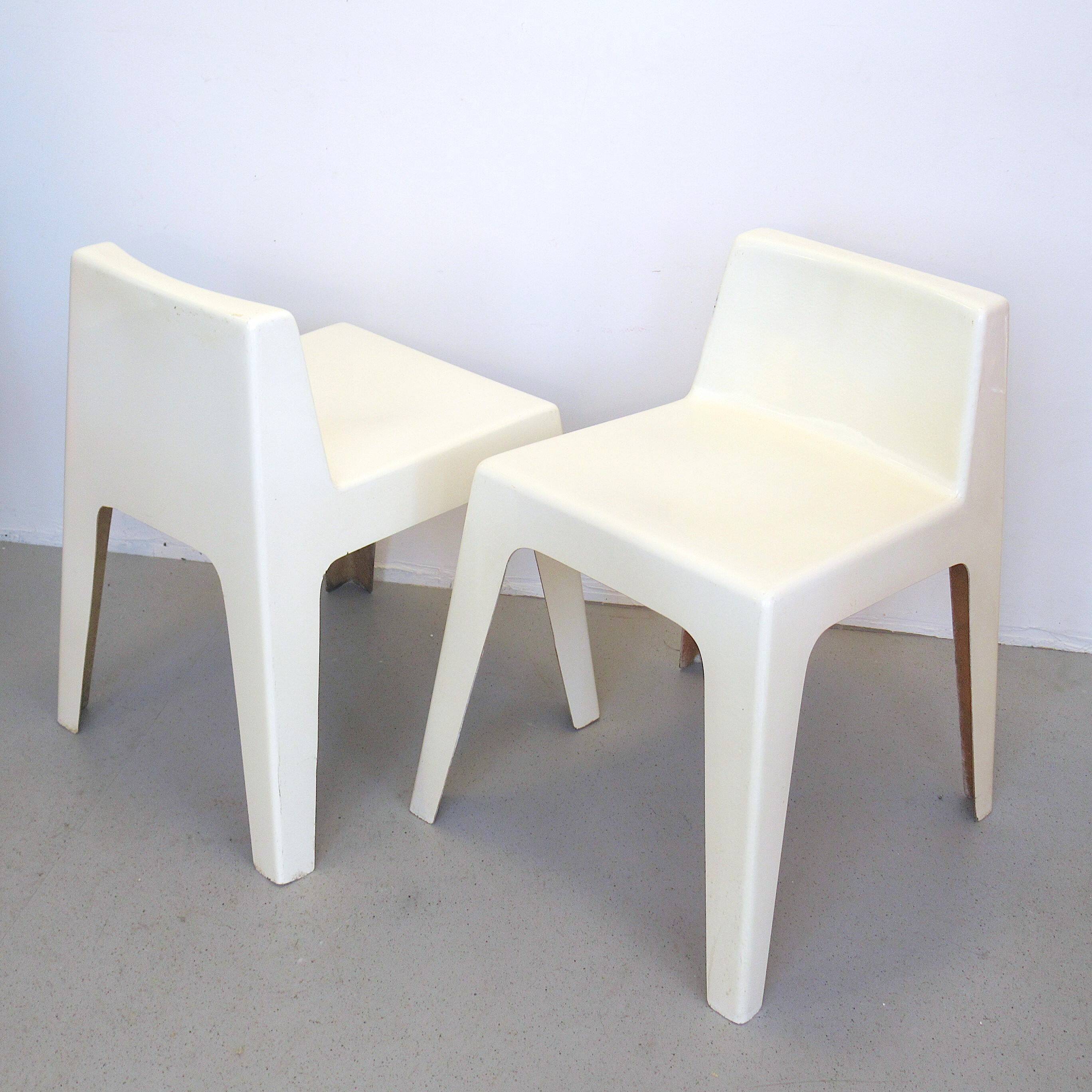 Two white fiberglass Kostka chairs 1970