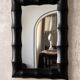 Rectangular mirror in patinated black wood resembling bamboo – 68 × 100 cm