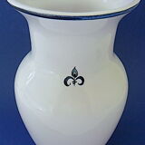 White-blue earthenware vase with stylized plant decoration