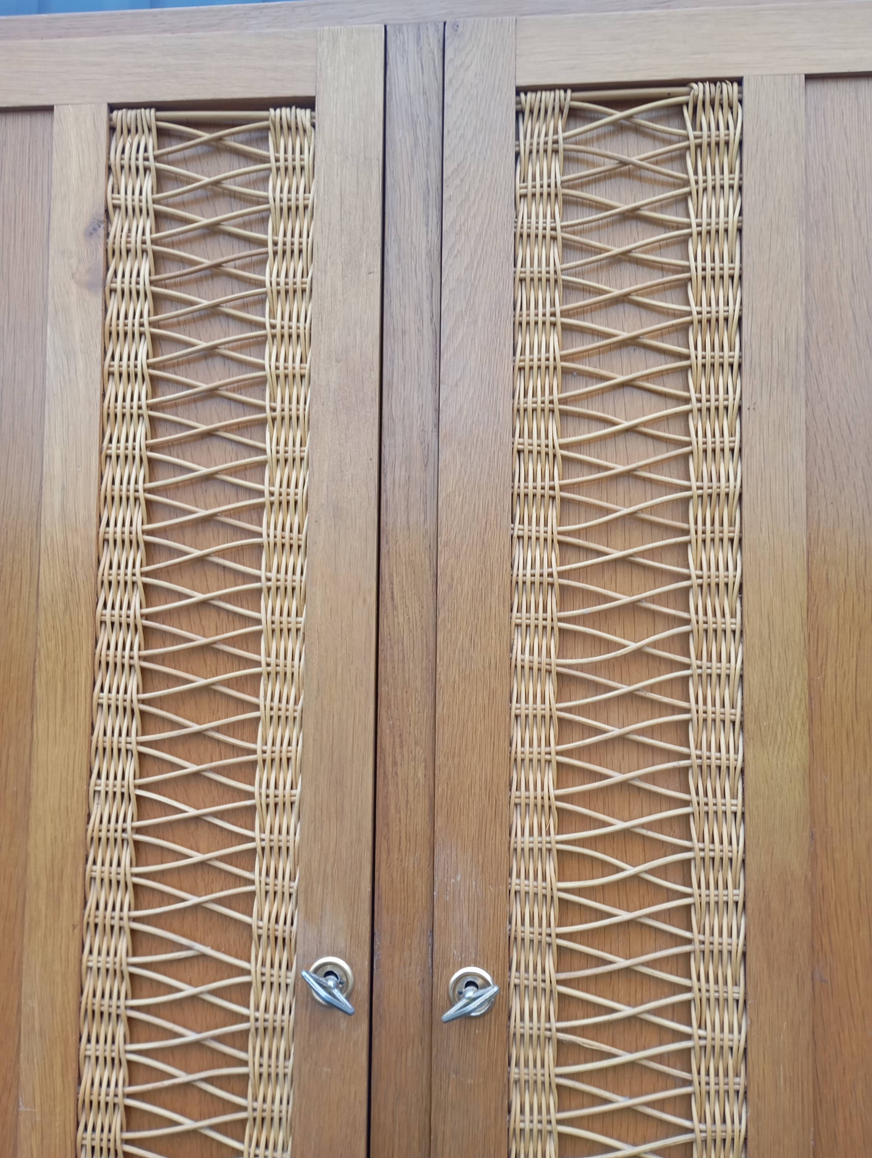 Vintage oak and rattan wardrobe