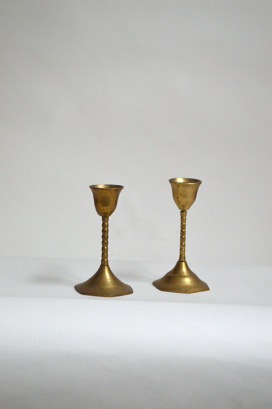 Pair of brass candle holders