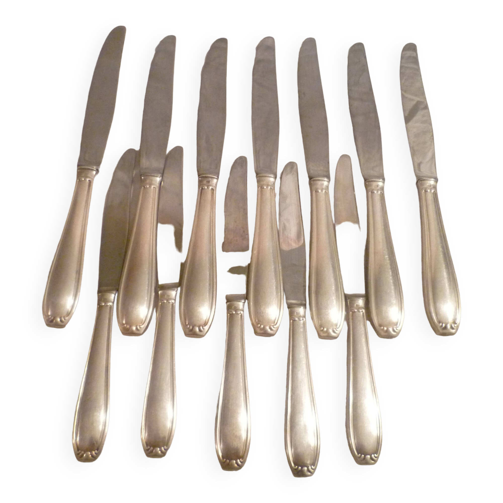 Set of 7 table knives & 5 fruit/cheese knives in silver art deco style