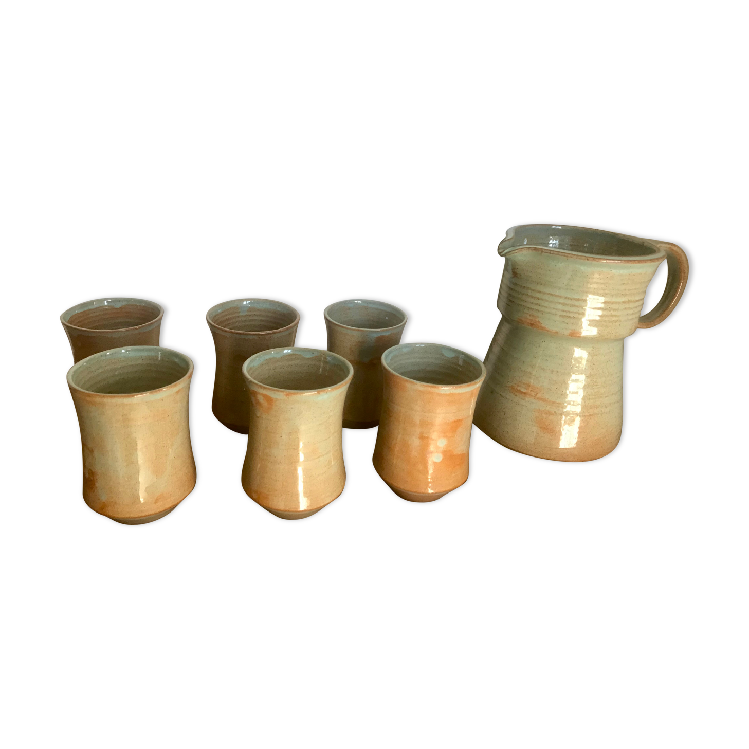 Pitcher and its vintage sandstone glasses