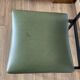 green and metal skai chair
