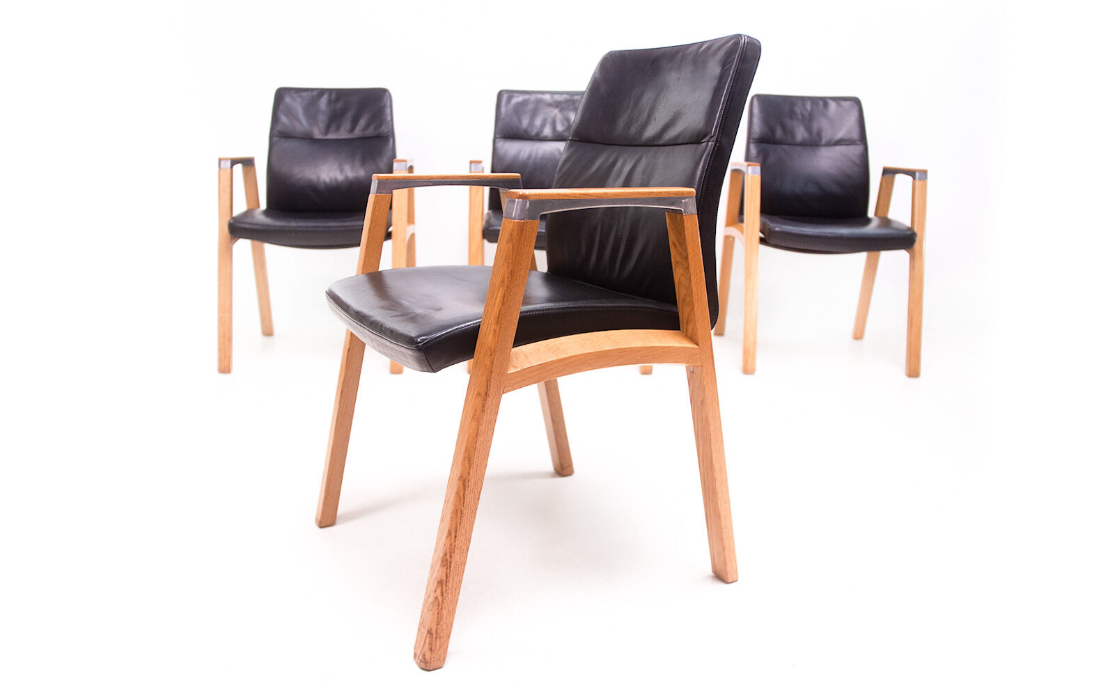 A Set of Four Sven Christiansen for Sven Fulcrum Leather Office Armchairs