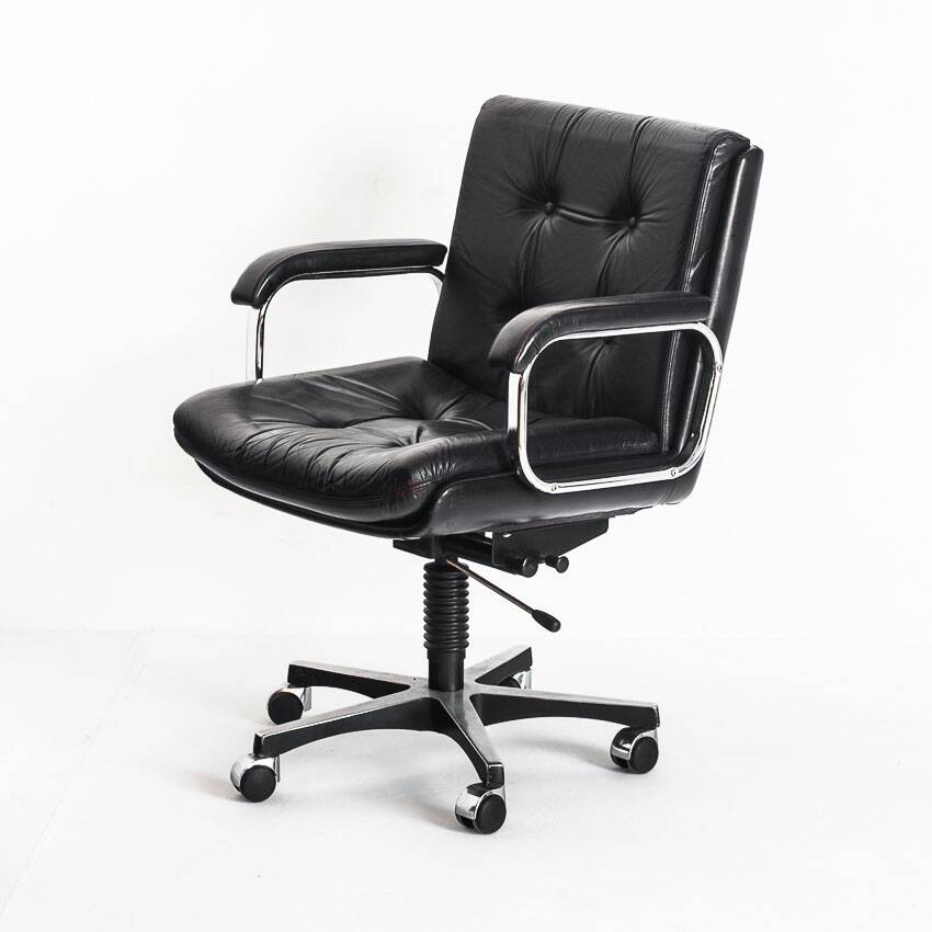 Vintage leather armchair. Swivel, on casters, multi-position. Norway, 1970s.