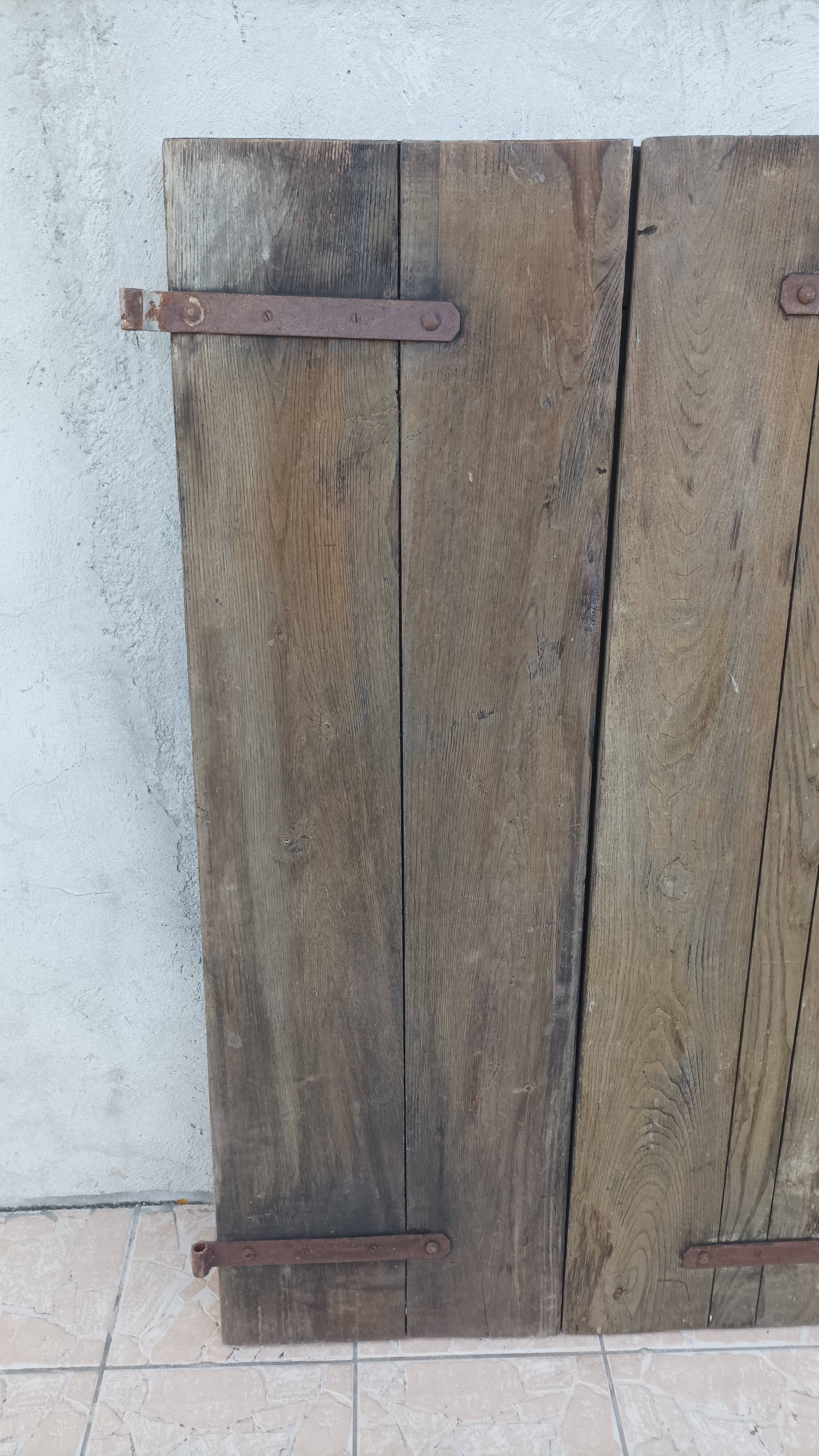 Pair of antique oak shutters