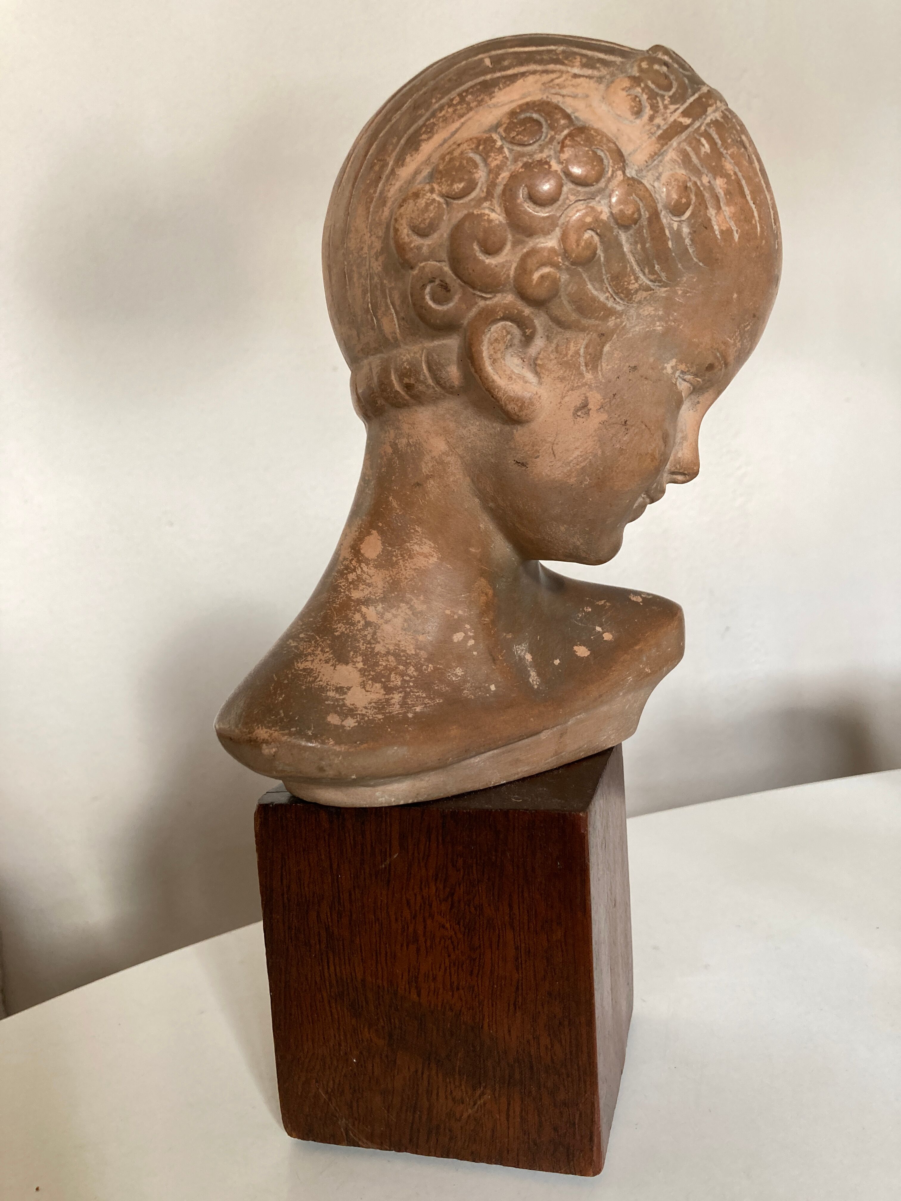 Child's head in terracotta 1920 wooden base