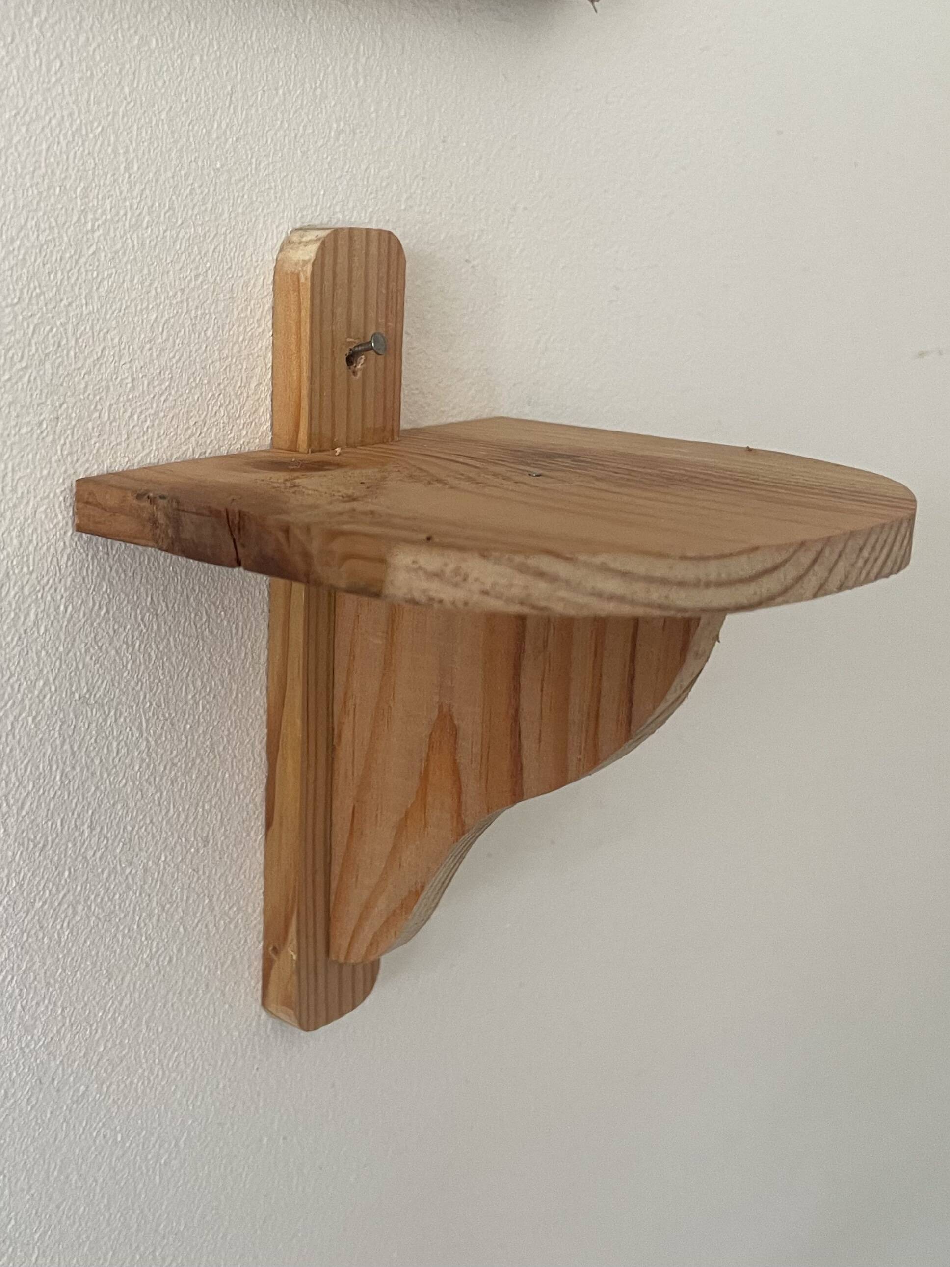 Small wooden wall shelf