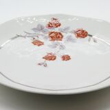 Ancien plat en porcelaine avec des roses et anses argentées