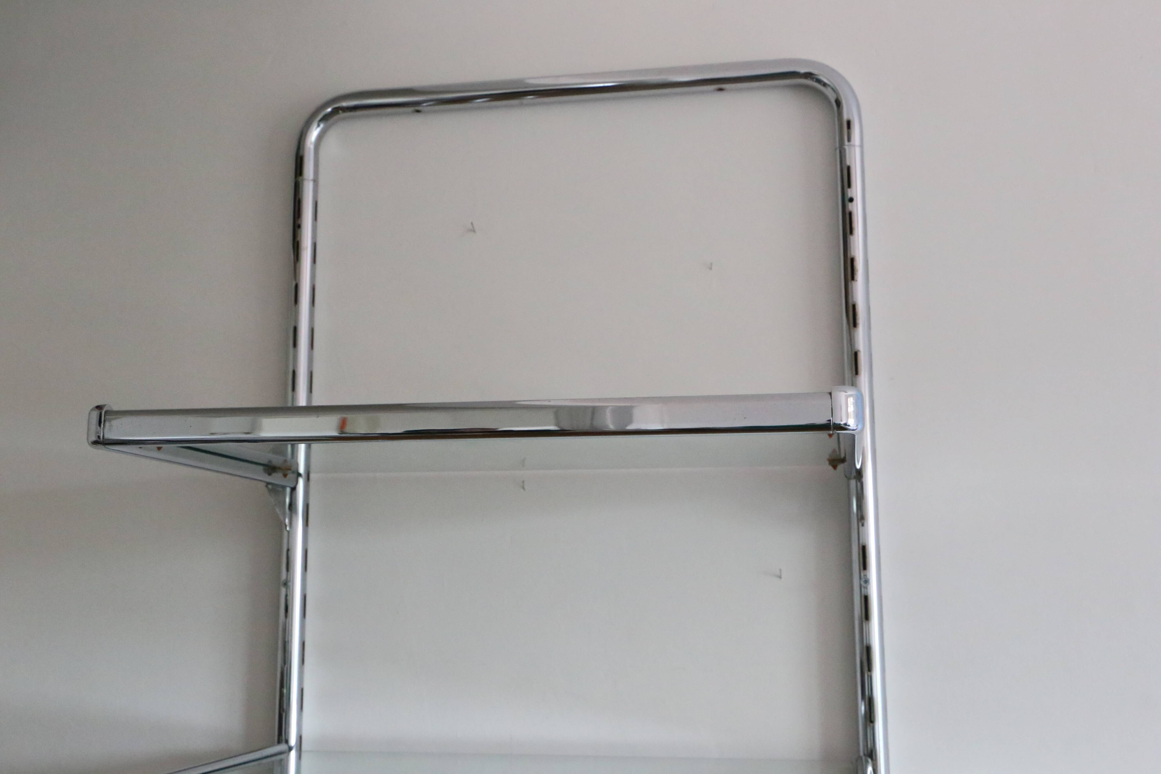Chrome and glass wall shelf, circa 1960