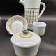 Vintage 1960s coffee service in ceramic, modernist design.