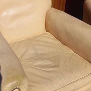 Pair of 1930s club armchairs in ivory leather.