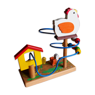 Game of awakening louping the hen and its 3 wooden chicks