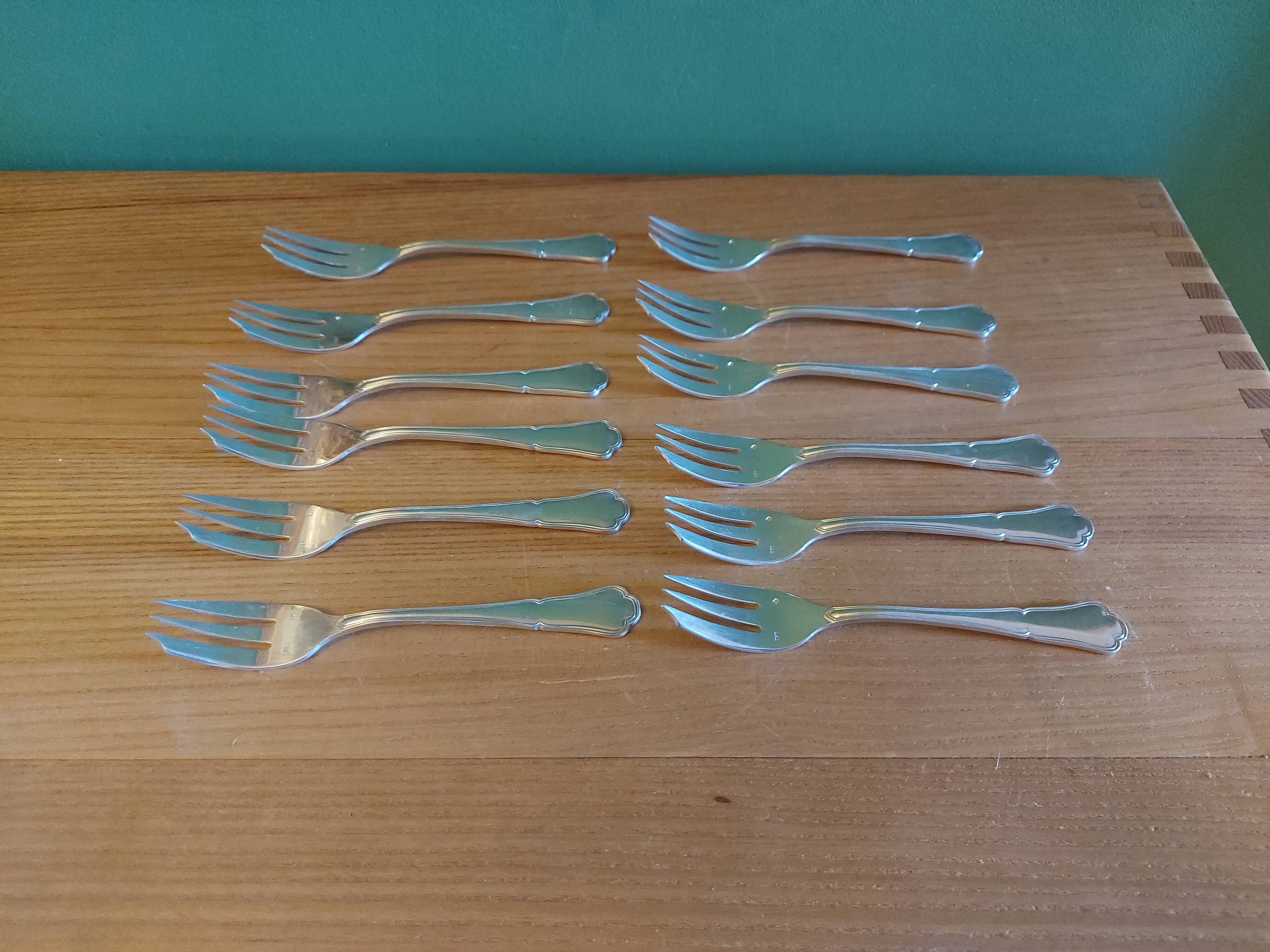 Box of 12 dessert forks in silver metal