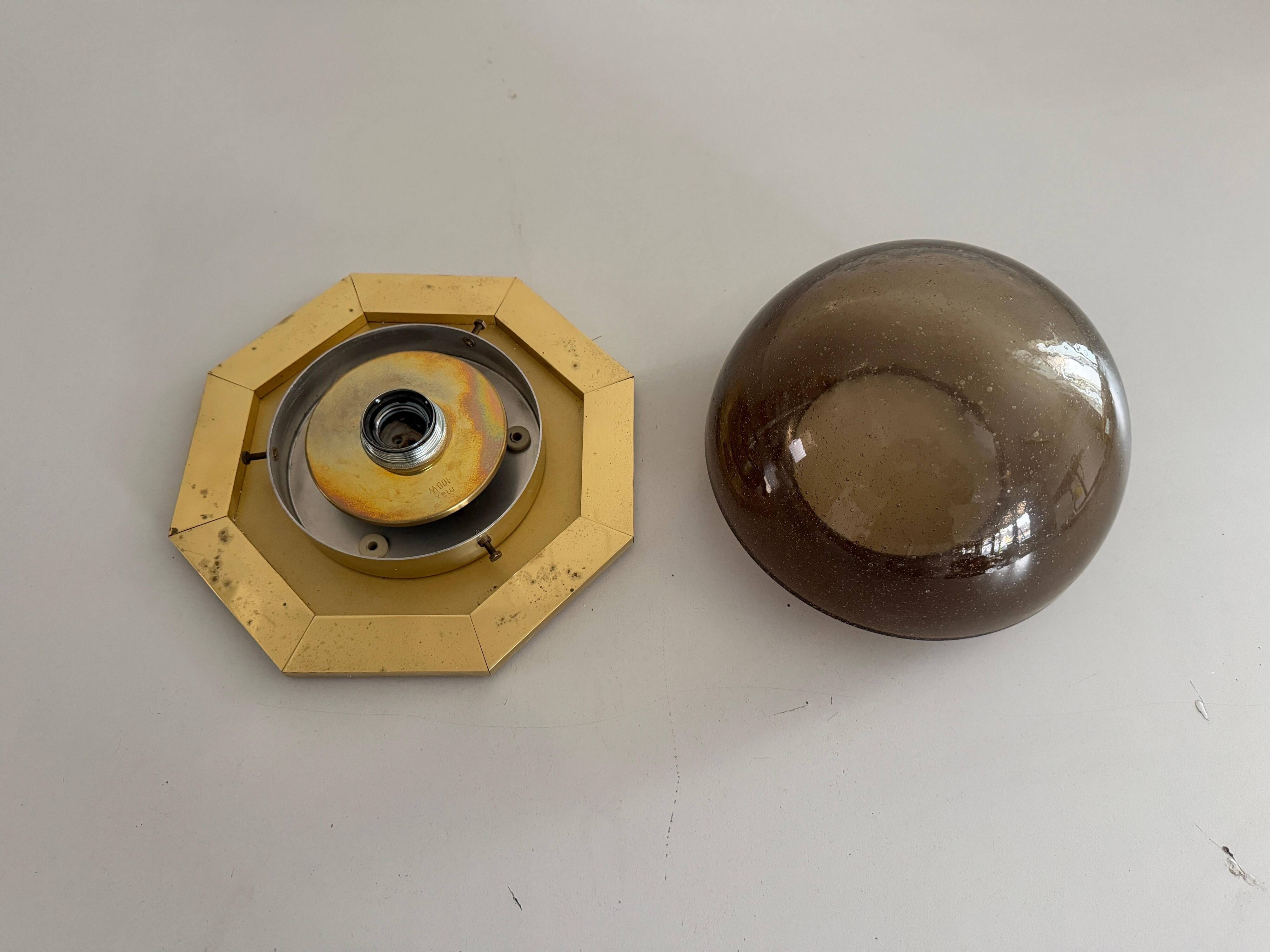 Octagonal ceiling light in brown glass and brass base by Limburg, 1960s, Germany.