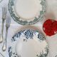Old mismatched dinner plates accompanied by a dish
