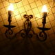 Pair of wrought iron wall lamps