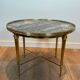 Round coffee table in brass with a marble top from the Ramsay house.