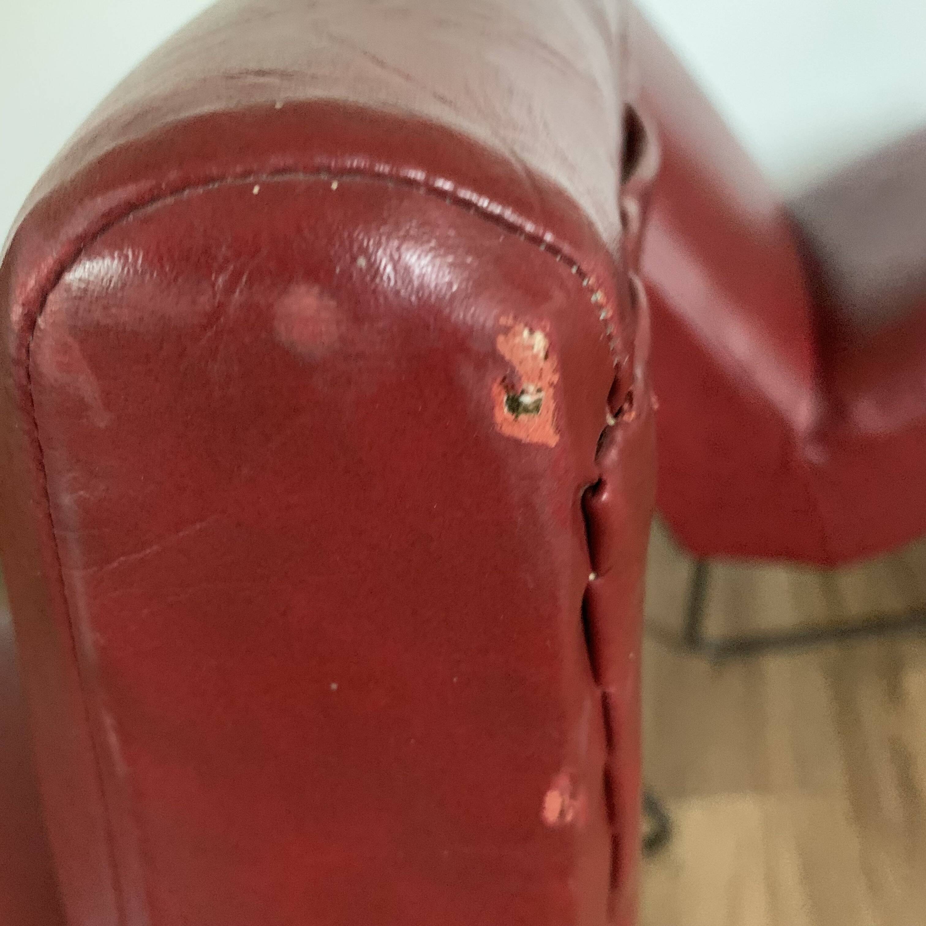 Pair of vintage burgundy red armchairs