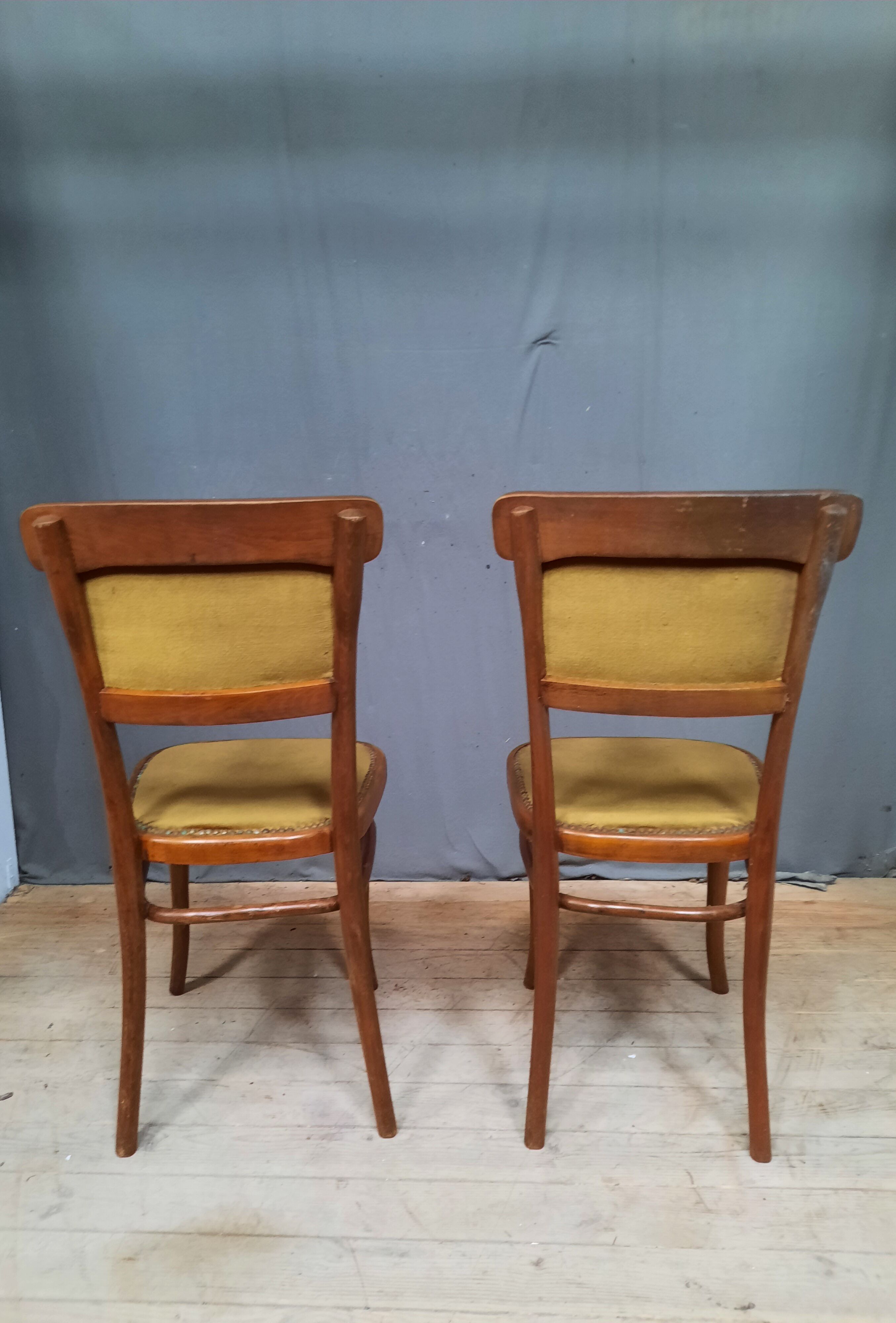 Pair of armchair and chair in curved wood