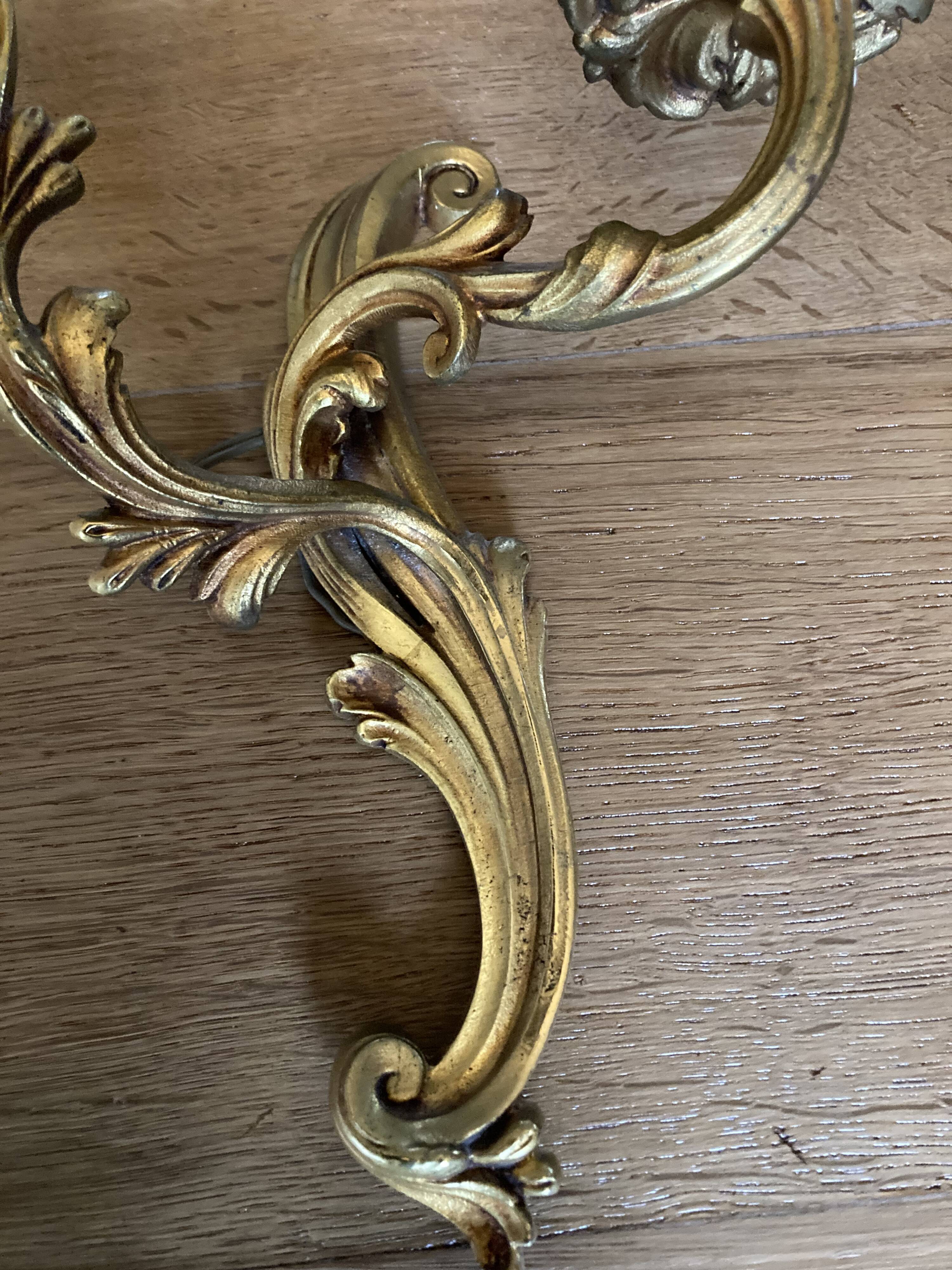 Pair of bronze wall lamps