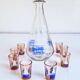 Carafe et 9 verres à liqueur à décor de voiliers