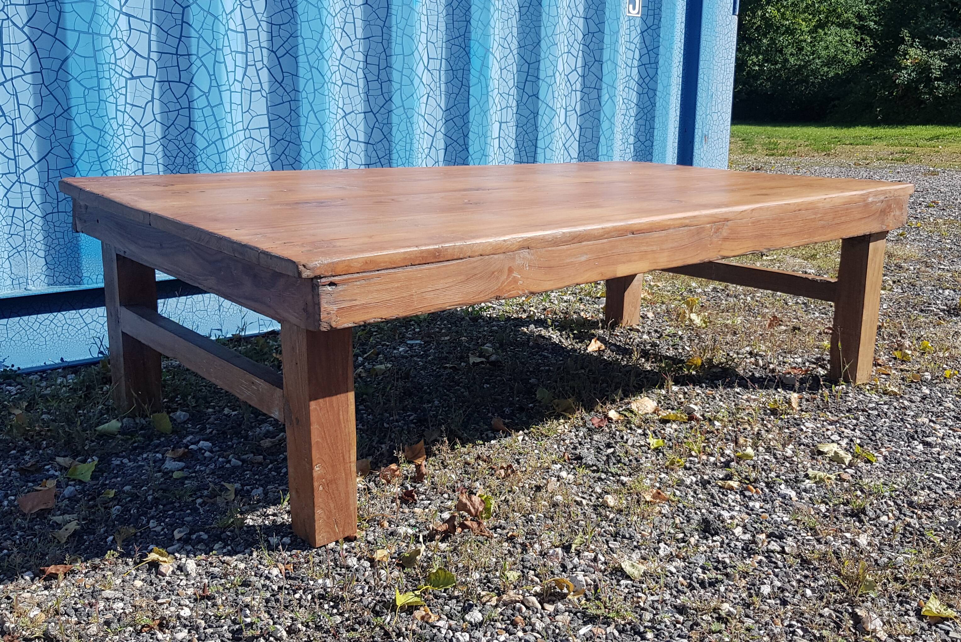 Old industrial workshop coffee table made of solid teak.