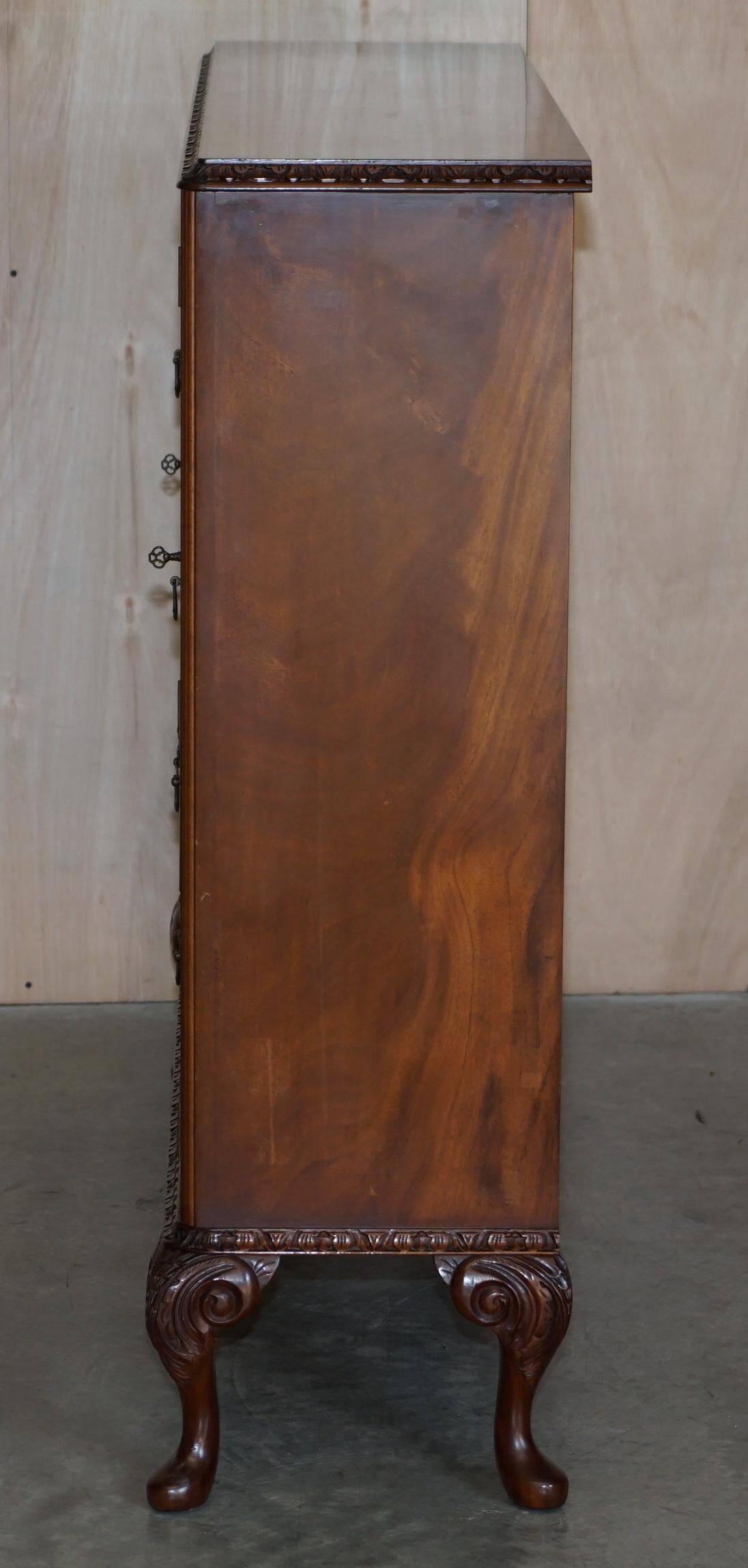 Vintage buffet display cabinet circa 1940 in flame mahogany and satinwood.