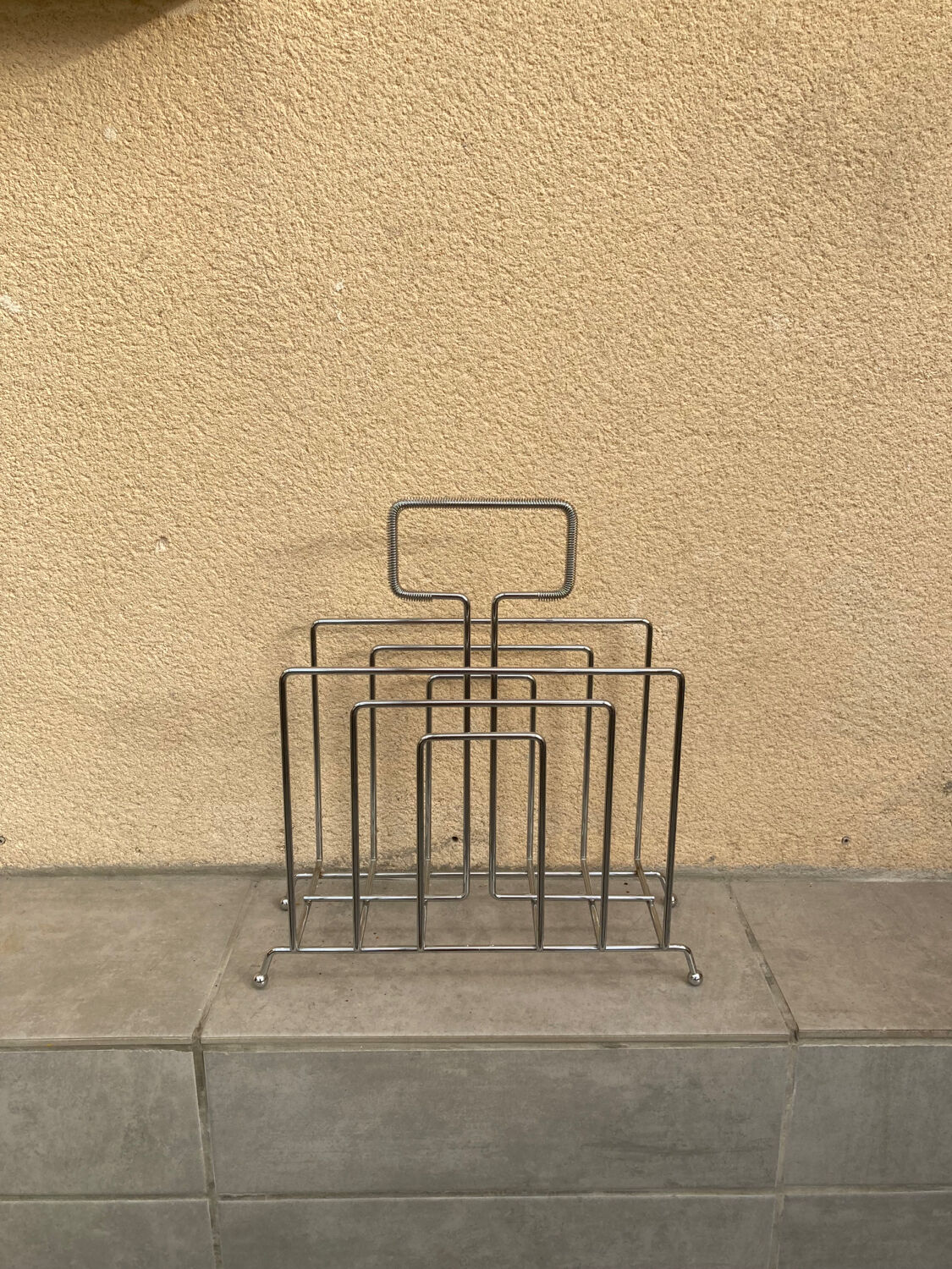 Chrome magazine rack