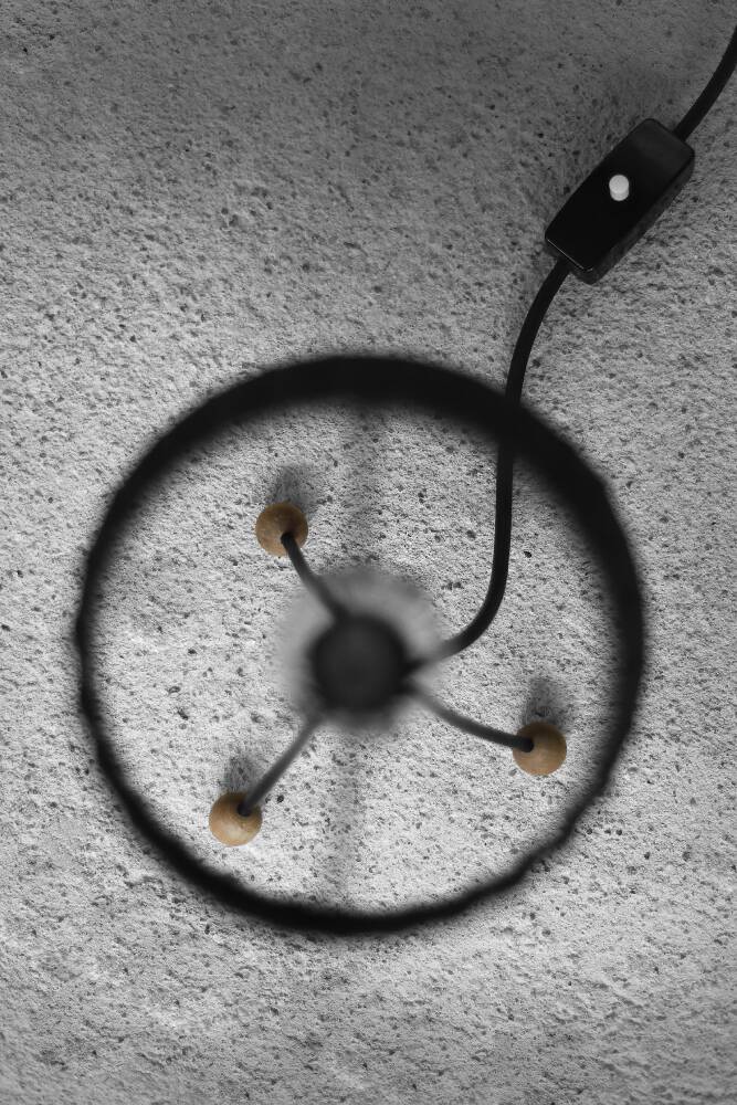 Small modern Polish table lamp from the mid-century with a black shade, 1960s.