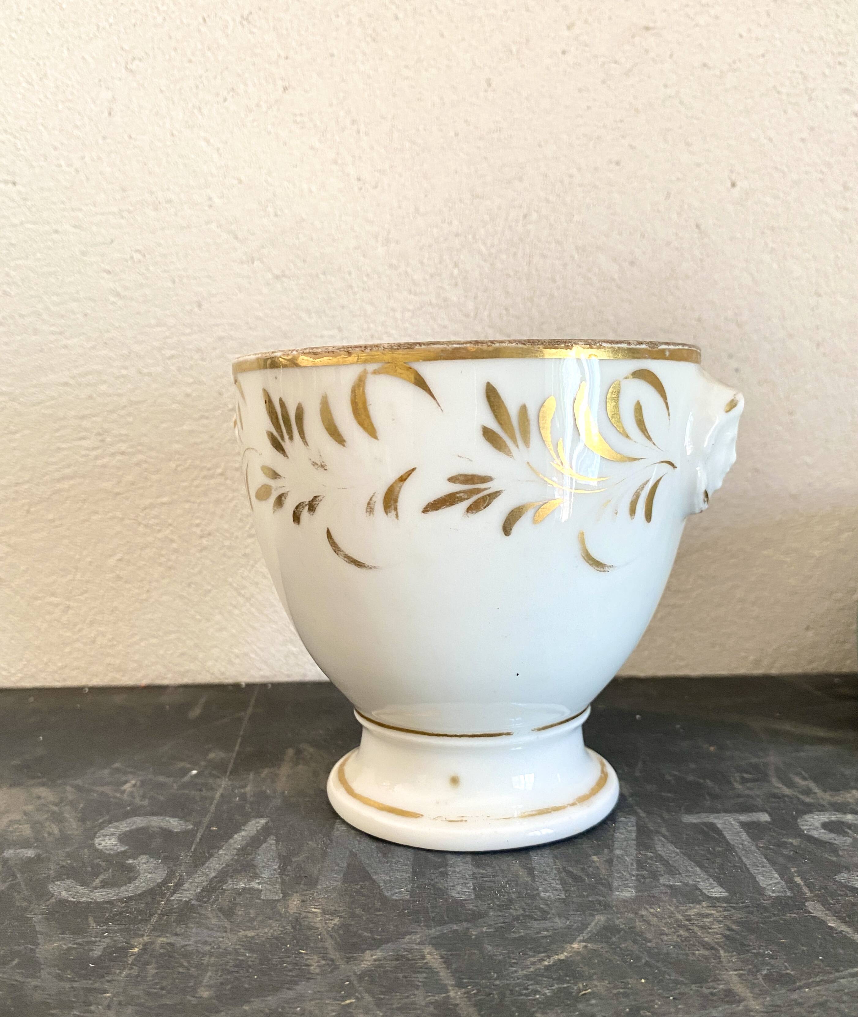 Pot céramique têtes antiques