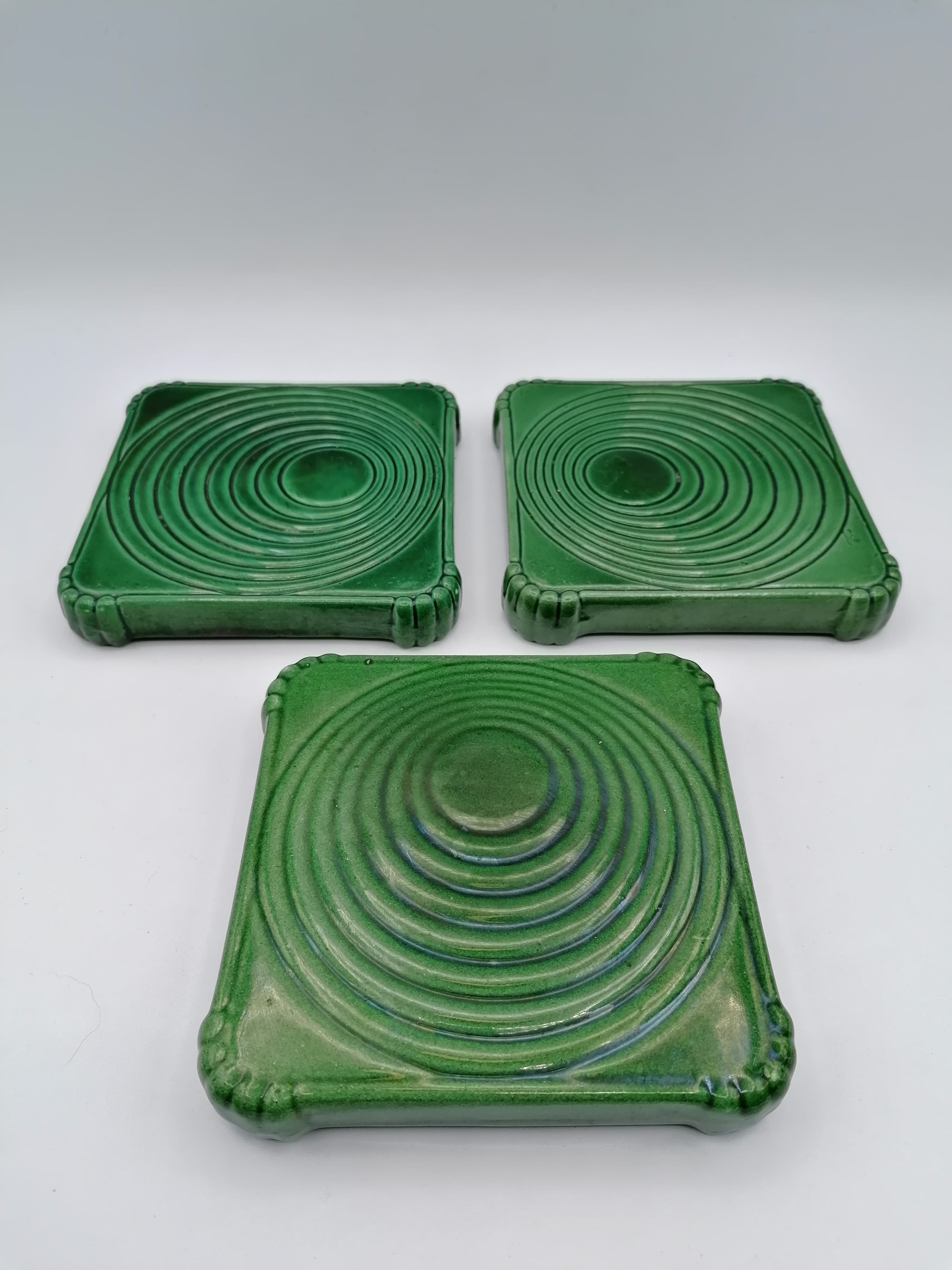 Under the plate and 3 under the bottle