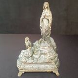 Metal statue and music box
