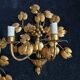 Stunning vintage wall lights in gilded iron with vine and grape decor from Italy.