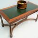 Mahogany coffee table, green leather, bronze Empire style