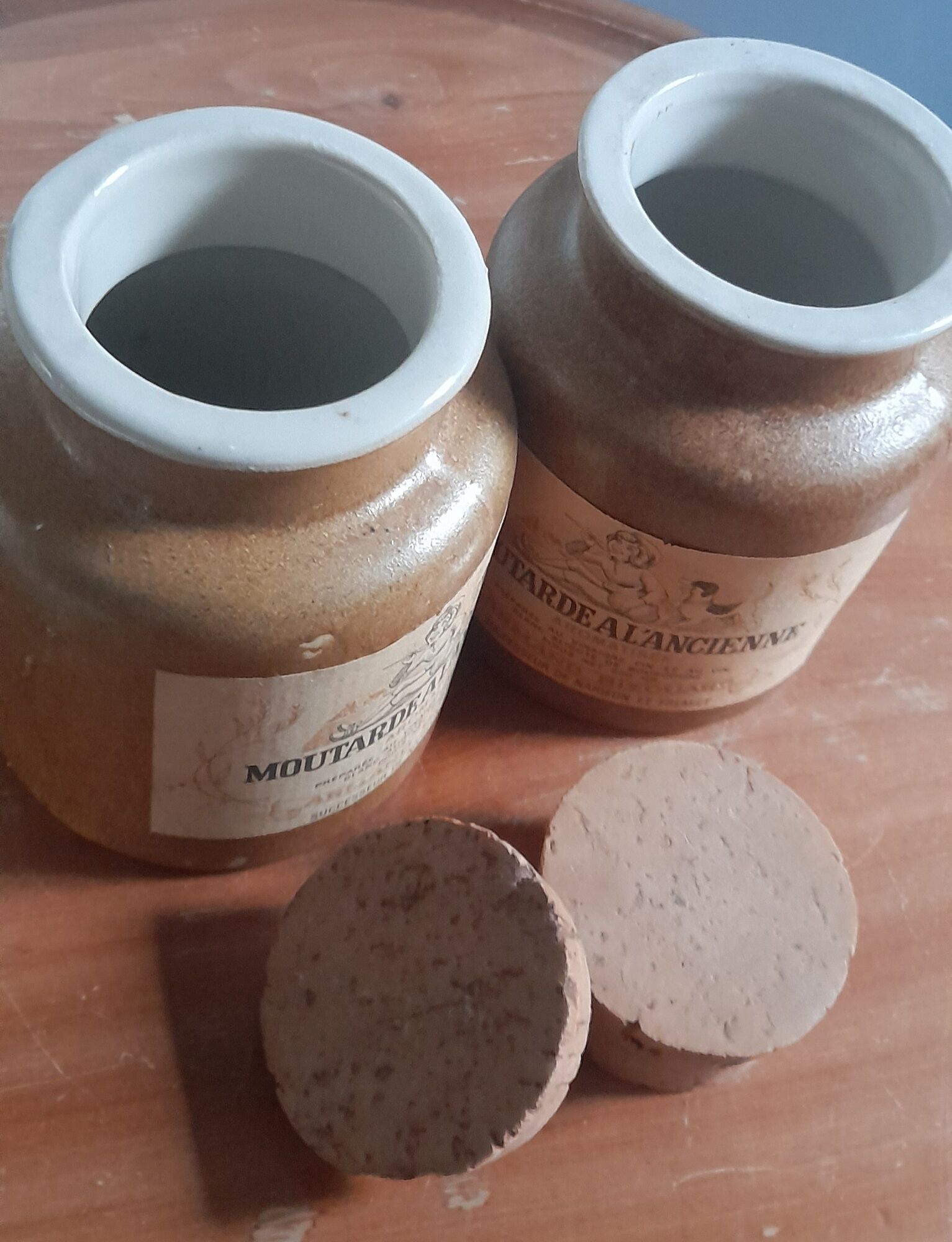Duo of glazed stoneware mustard pots with label and corks, armand bizouard, amora, 1950
