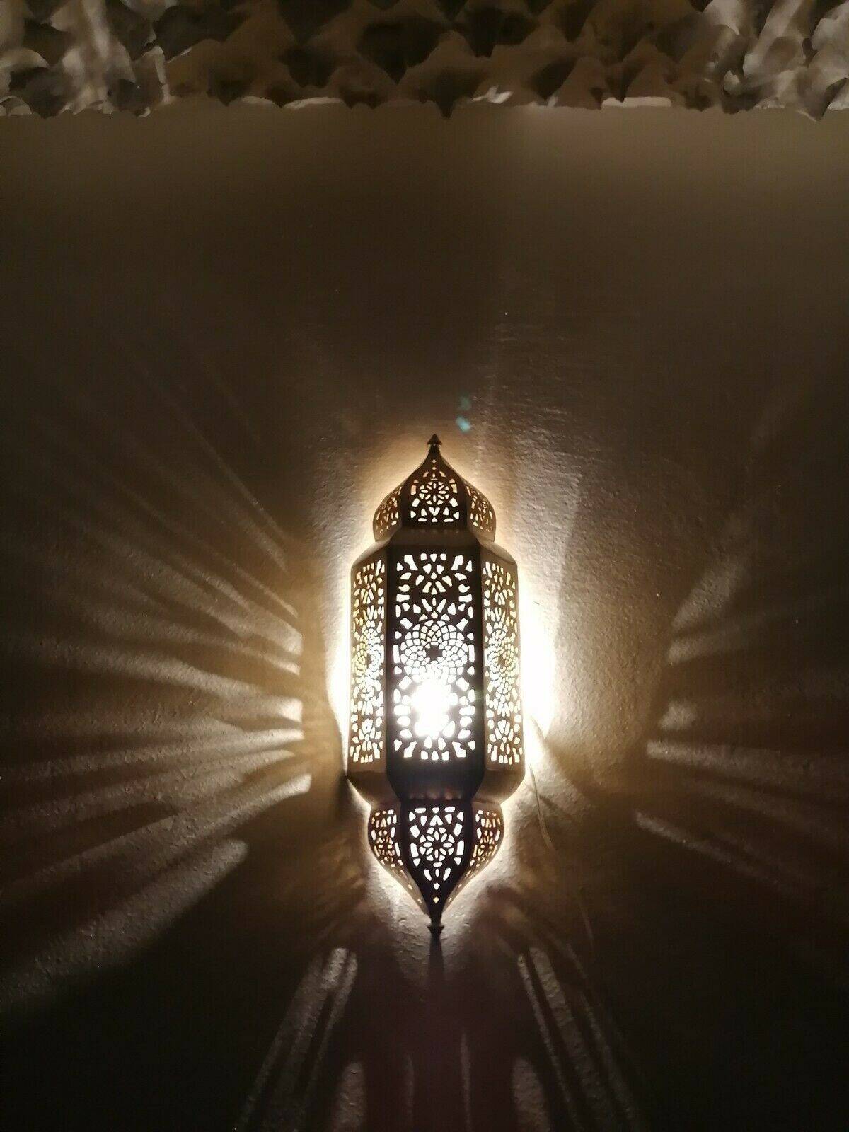 Moroccan brass wall lamp with an antique look